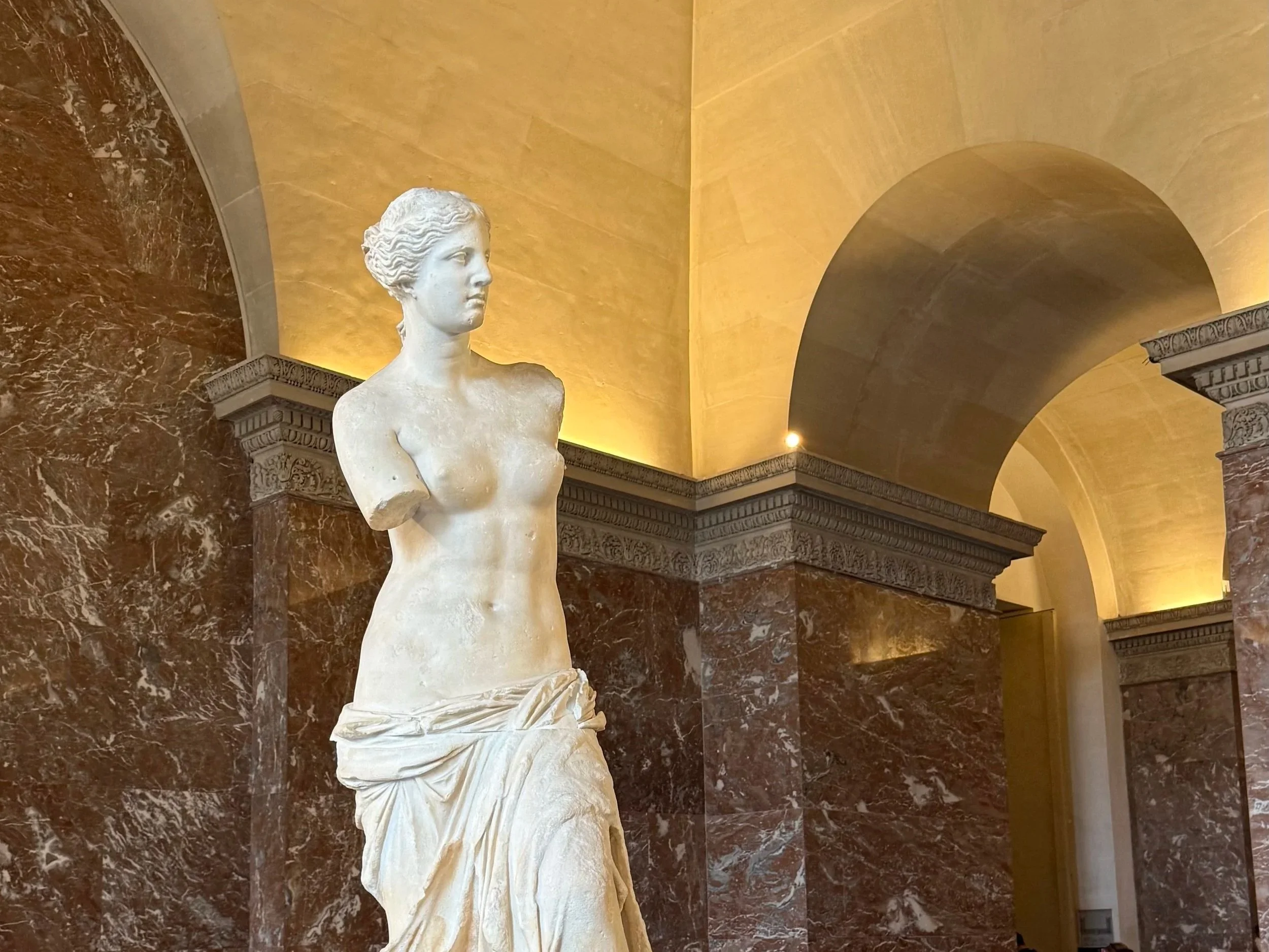 Venus de Milo statue at the Louvre Museum in Paris, France