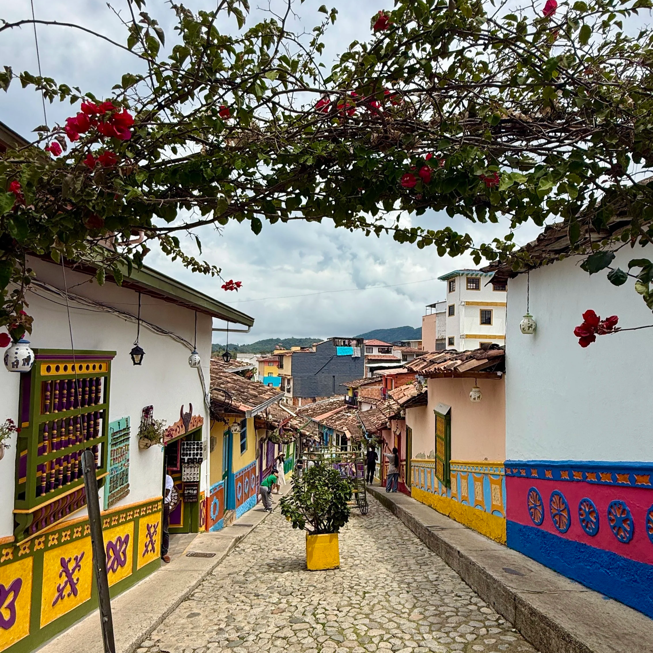 Guatapé town in Colombia with cobblestone streets and colorful zócalos