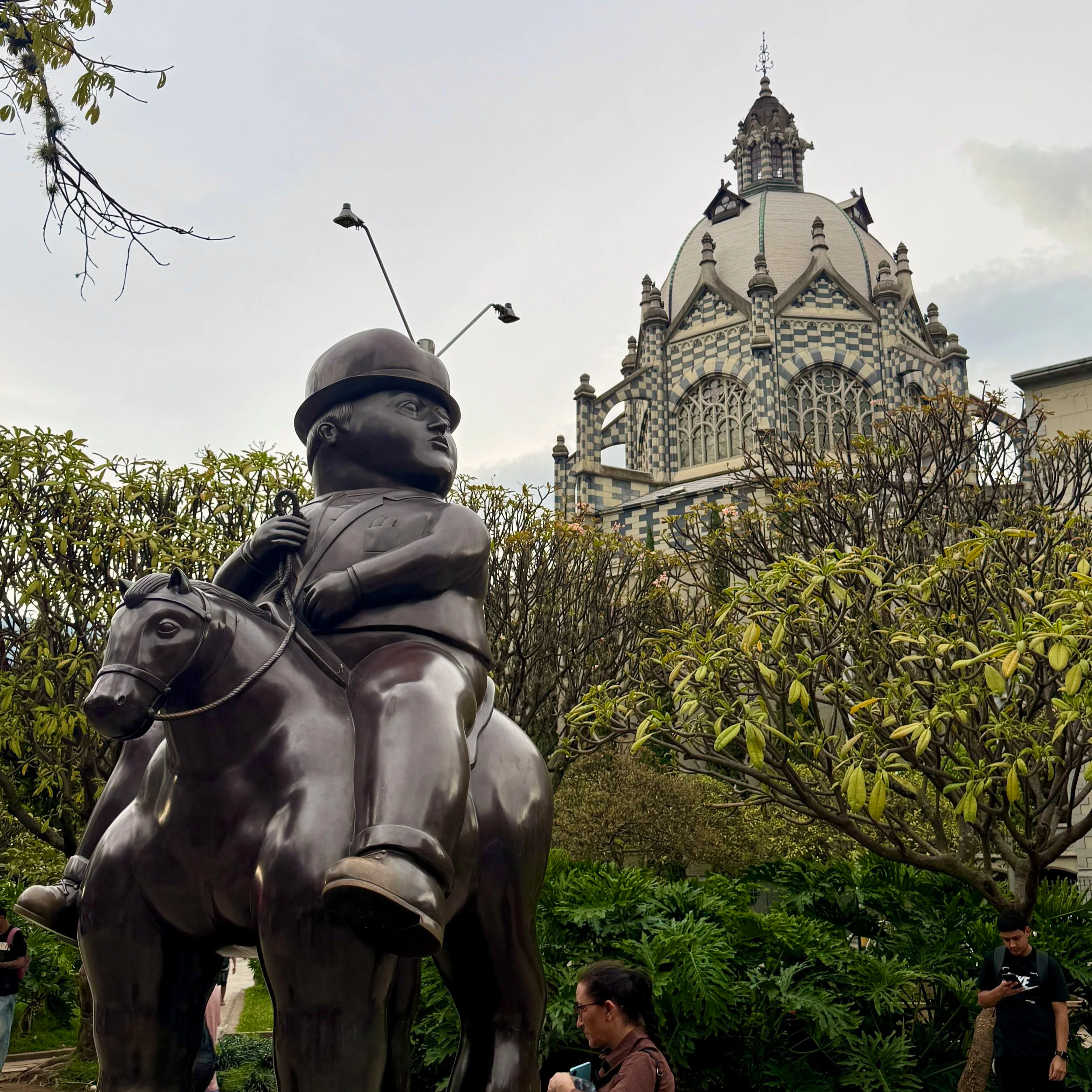 "Man on Horse" statue by Fernando Botero in front of the Palace of Culture Rafaél Uribe building in Plaza Botero in Medellín, Colombia