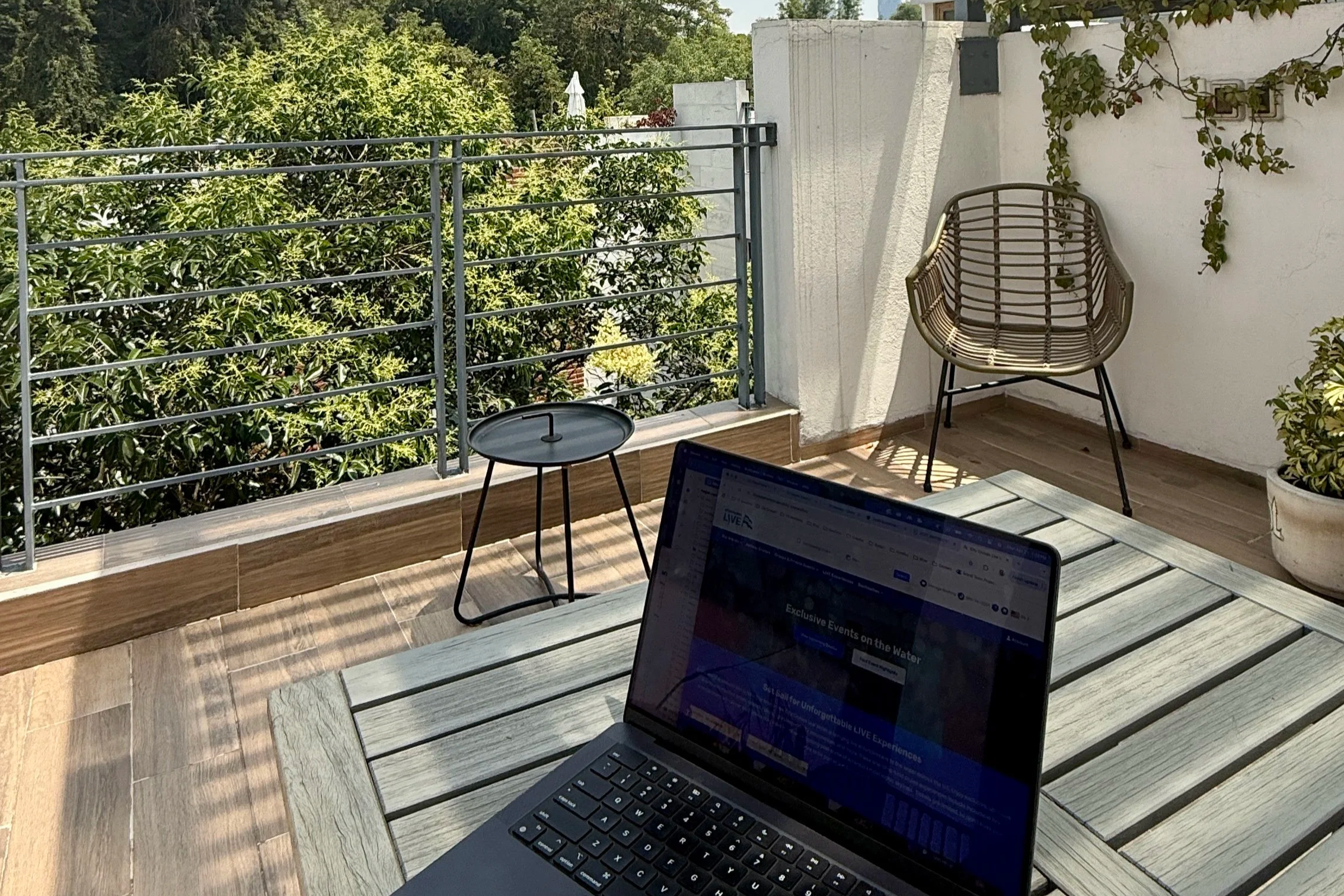 Laptop of a digital nomad on the terrace of a co-living house in Mexico City, Mexico