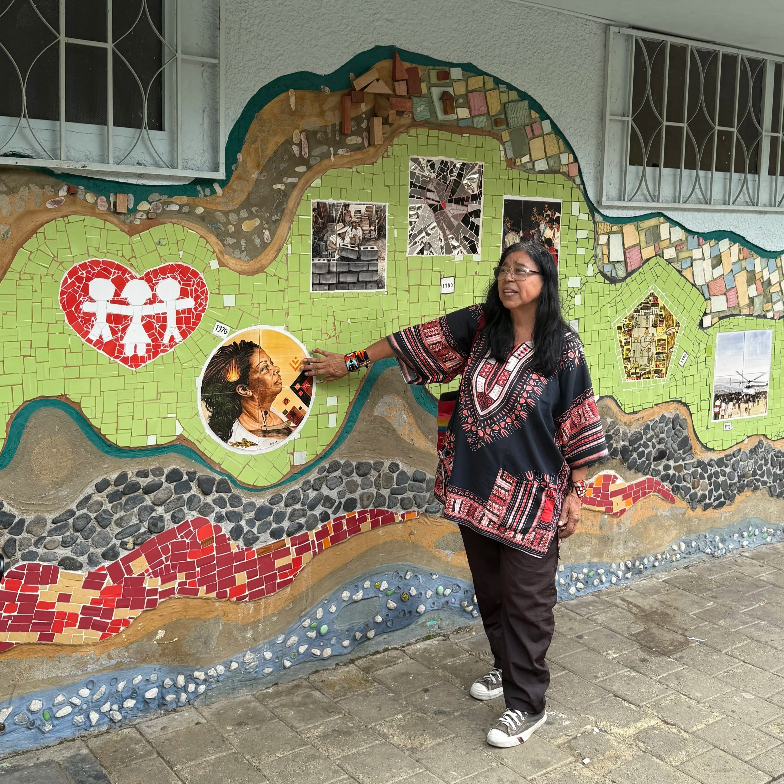 Community Leader Heroina in Moravia in Comuna 4 on the Barrio Transformation Tour with Real City Tours in Medellin Colombia