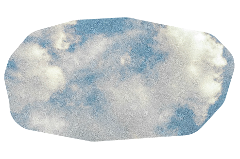 Wide oval of the cloudy sky outside.
