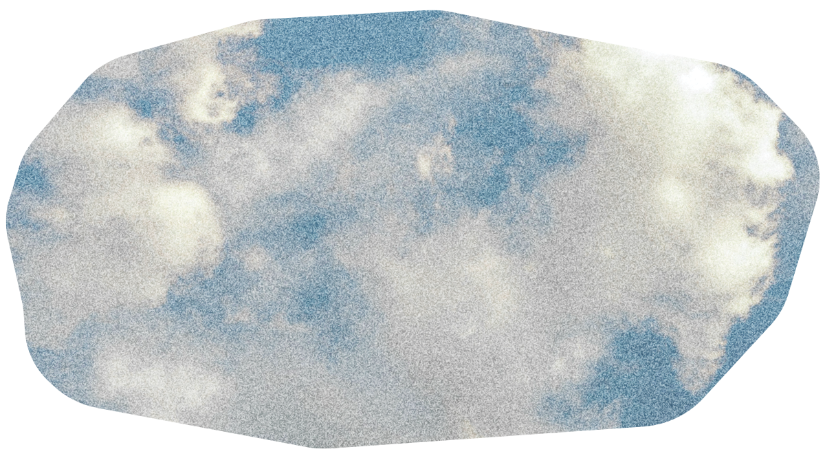 Wide oval of the cloudy sky outside.