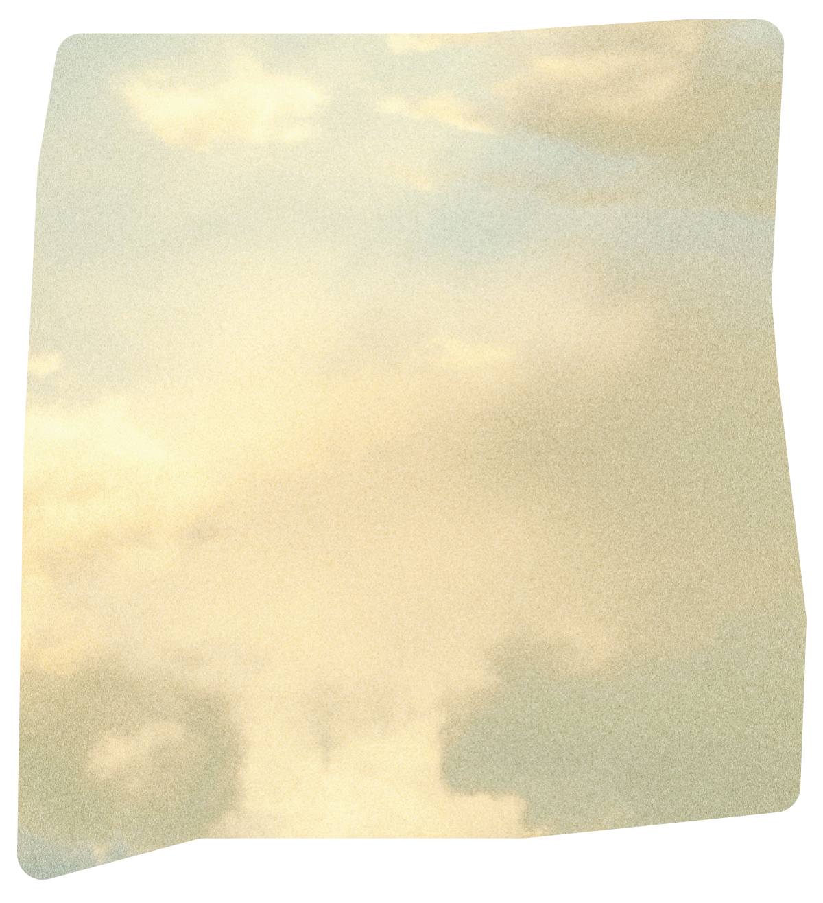 Cloudy sky with a warm, yellowish light.