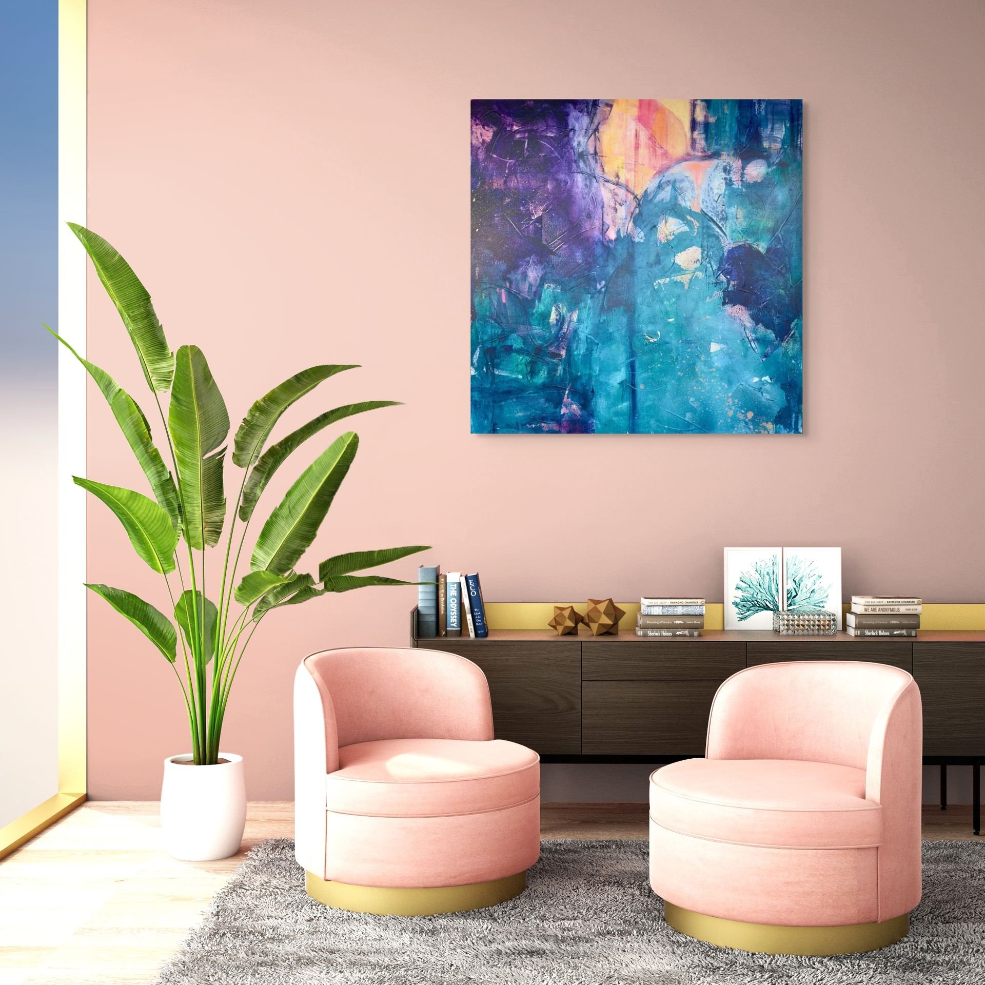 A modern living room corner with pink upholstered chairs, a large green plant in a white pot, a dark wood sideboard with books and decorative objects, pink painted walls, a colorful abstract painting, and a light gray rug.