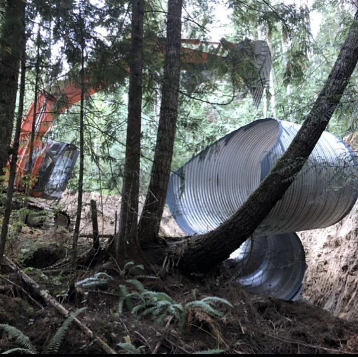 Large culvert installed with excavator