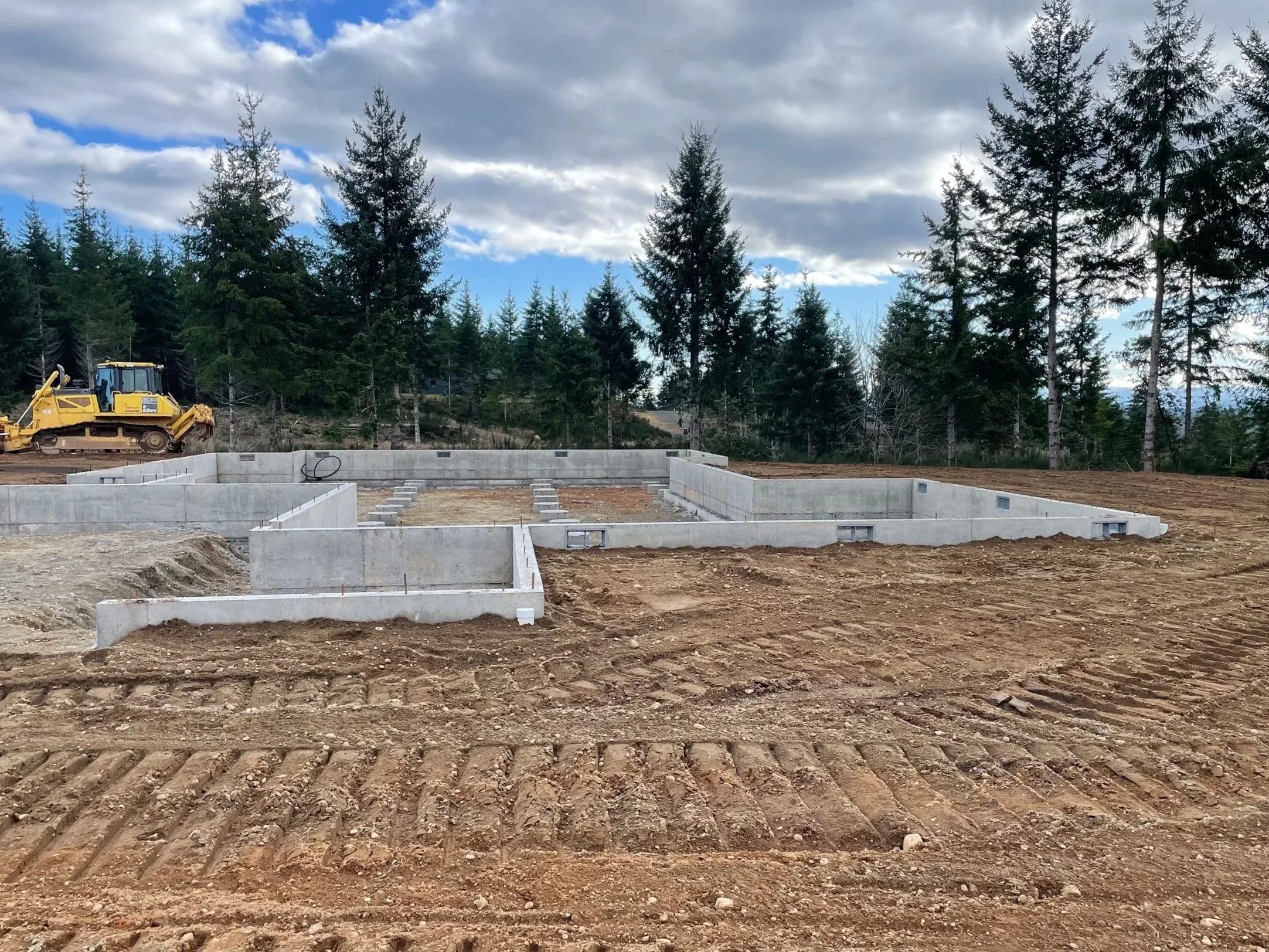 Site prep: foundation backfilled