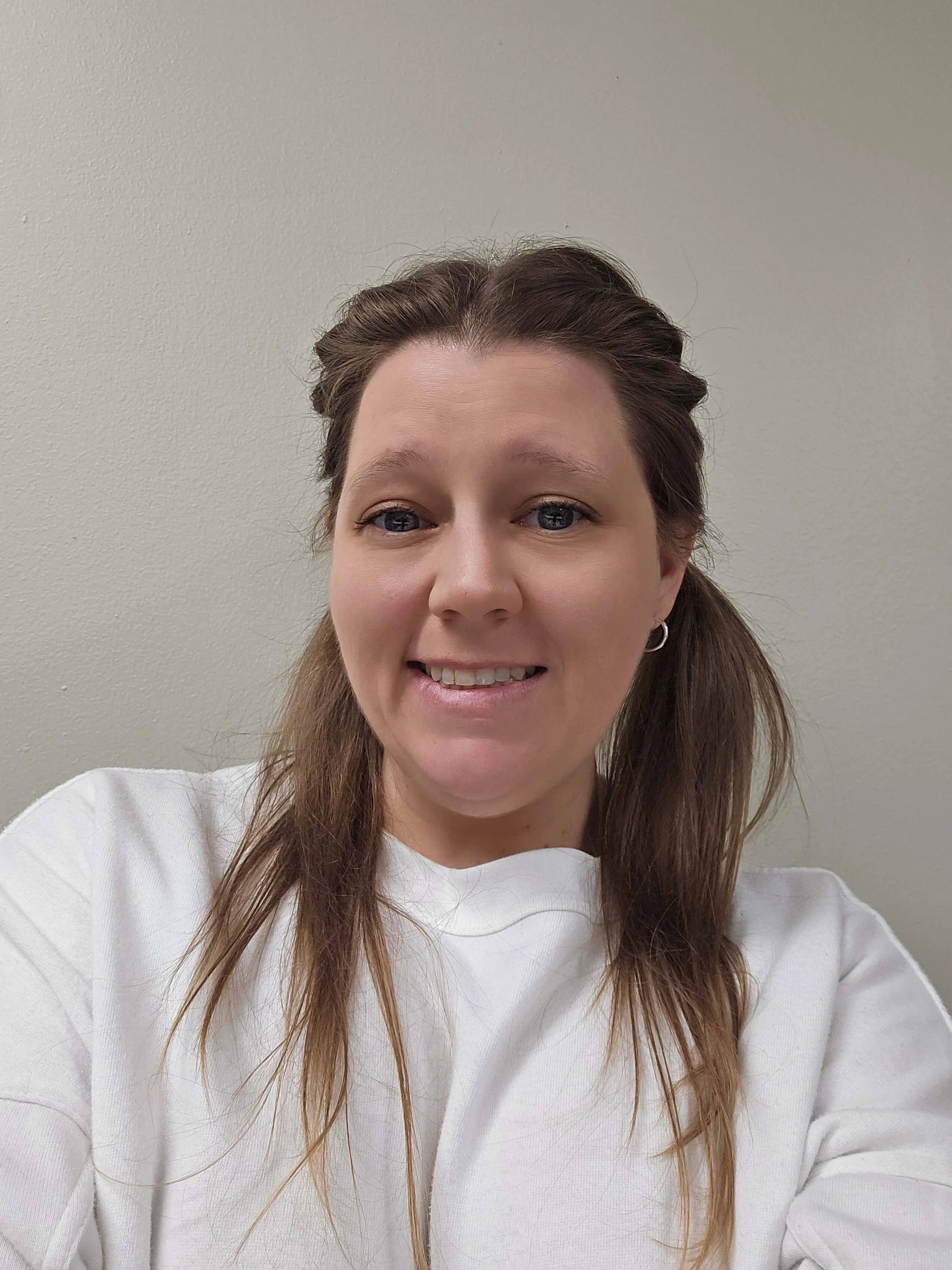 Jaimie hiring and enrollment manager of The Dream Works smiling.