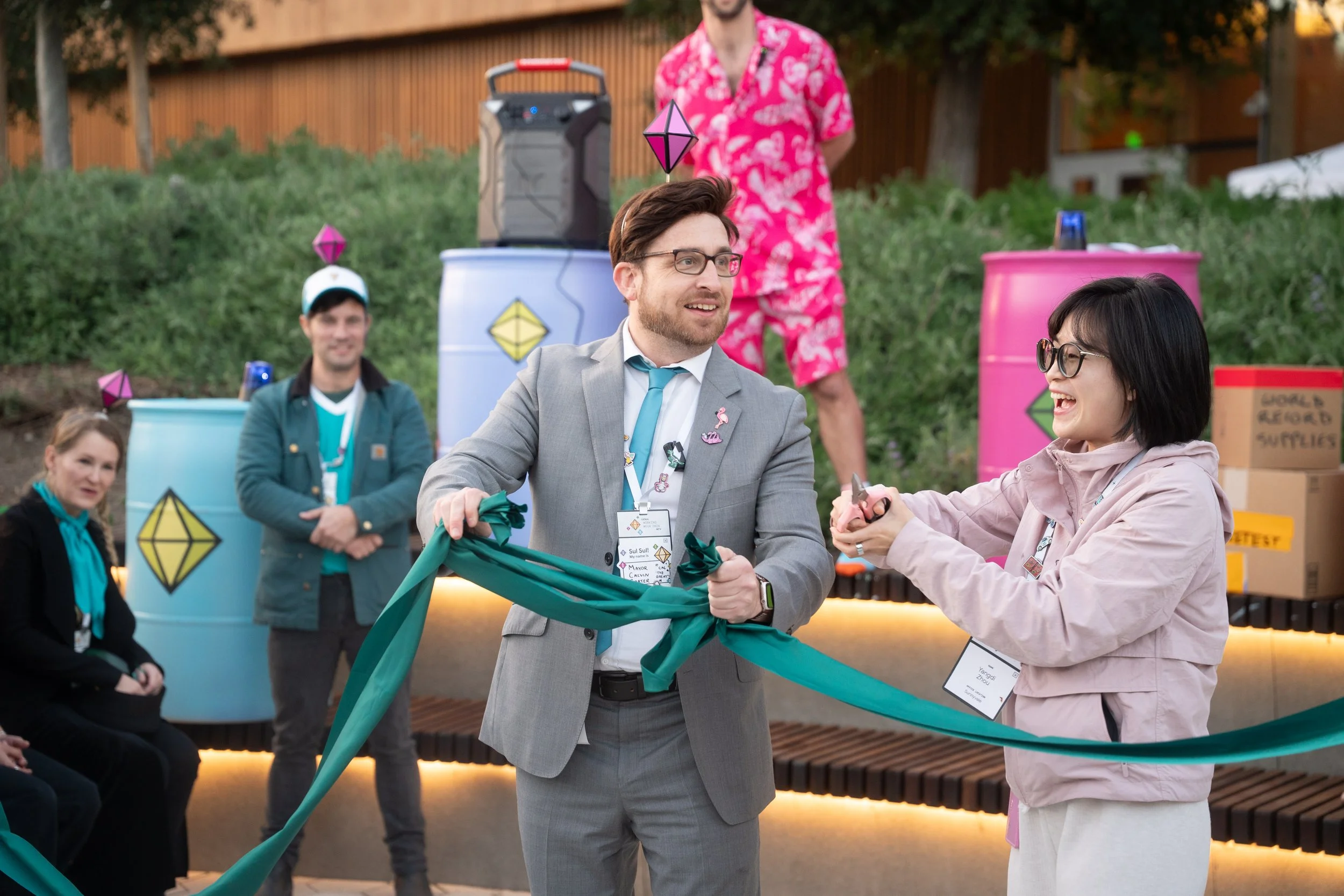Michael Feldman performs a Ribbon cutting as part of an immersive puzzle hut at the googleplex in Mountain View