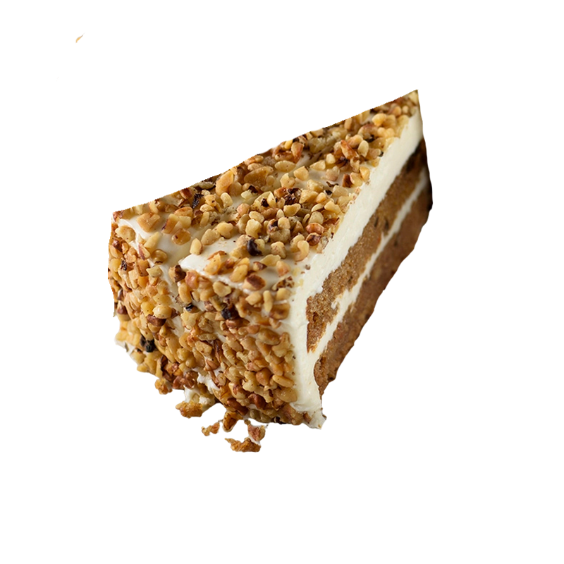 A slice of layered cake with white frosting and chopped nuts on top.