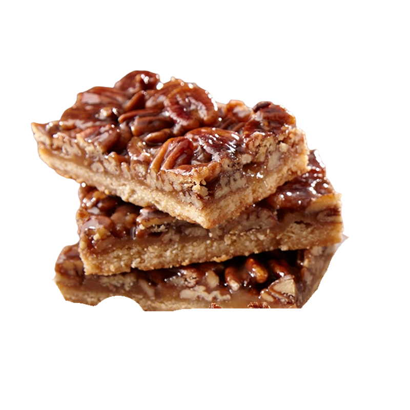 Stacked pecan caramel brownies with pecans on top.