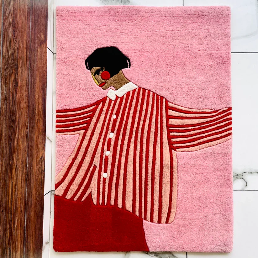 Girl in red stripes hand tufted rug.