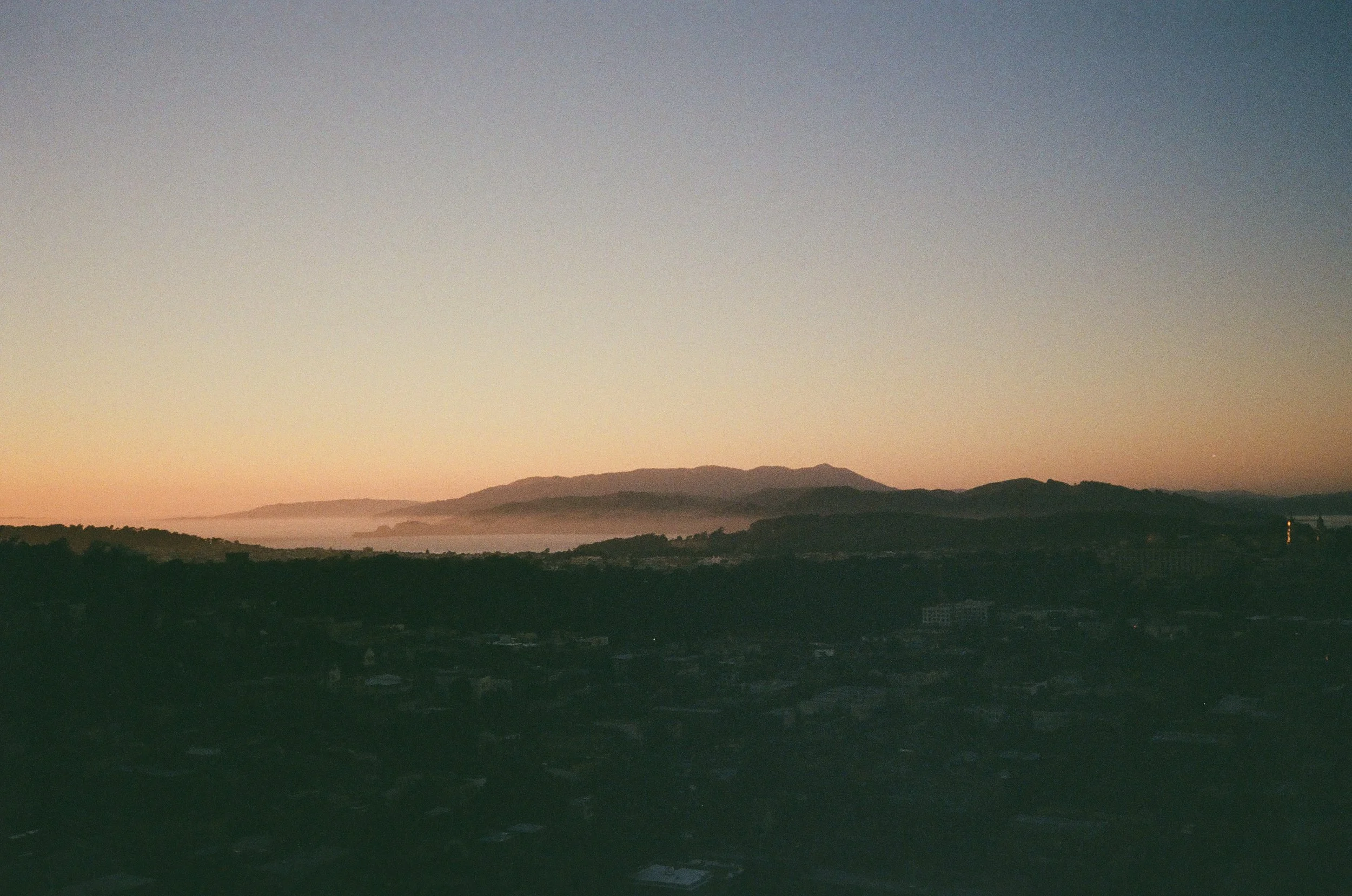 Sunset over the Marin Headlands with marine layer, viewed from Tank Hill Park