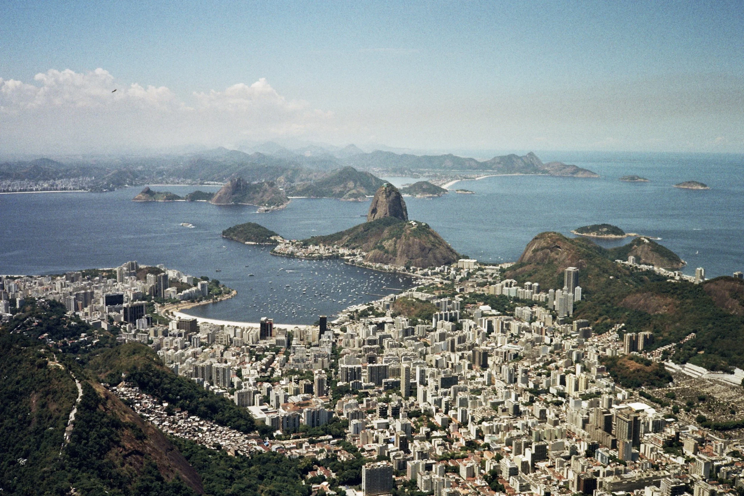 Aerial panorama of Rio de Janeiro with Sugarloaf Mountain rising from Guanabara Bay, viewed from Corcovado