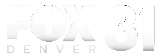 Close-up of a US driver's license displaying ID number, date of birth, and a photo ID on the left side.