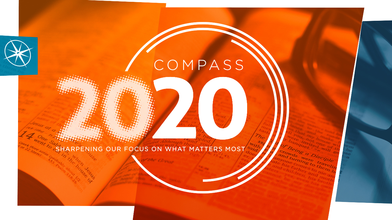 Graphic design featuring the number 20 in large dotted font, the word 'COMPASS' above it, and the phrase 'SHARPENING OUR FOCUS ON WHAT MATTERS MOST' below, over an open Bible with a pair of reading glasses in the background.