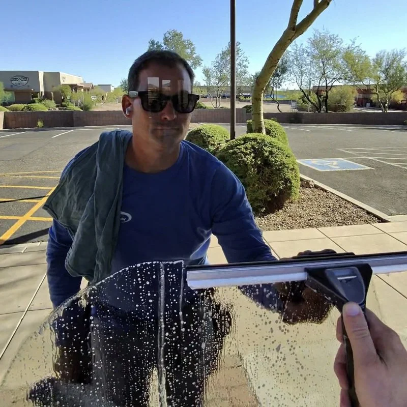 Brett Litt - Cleaning a Window