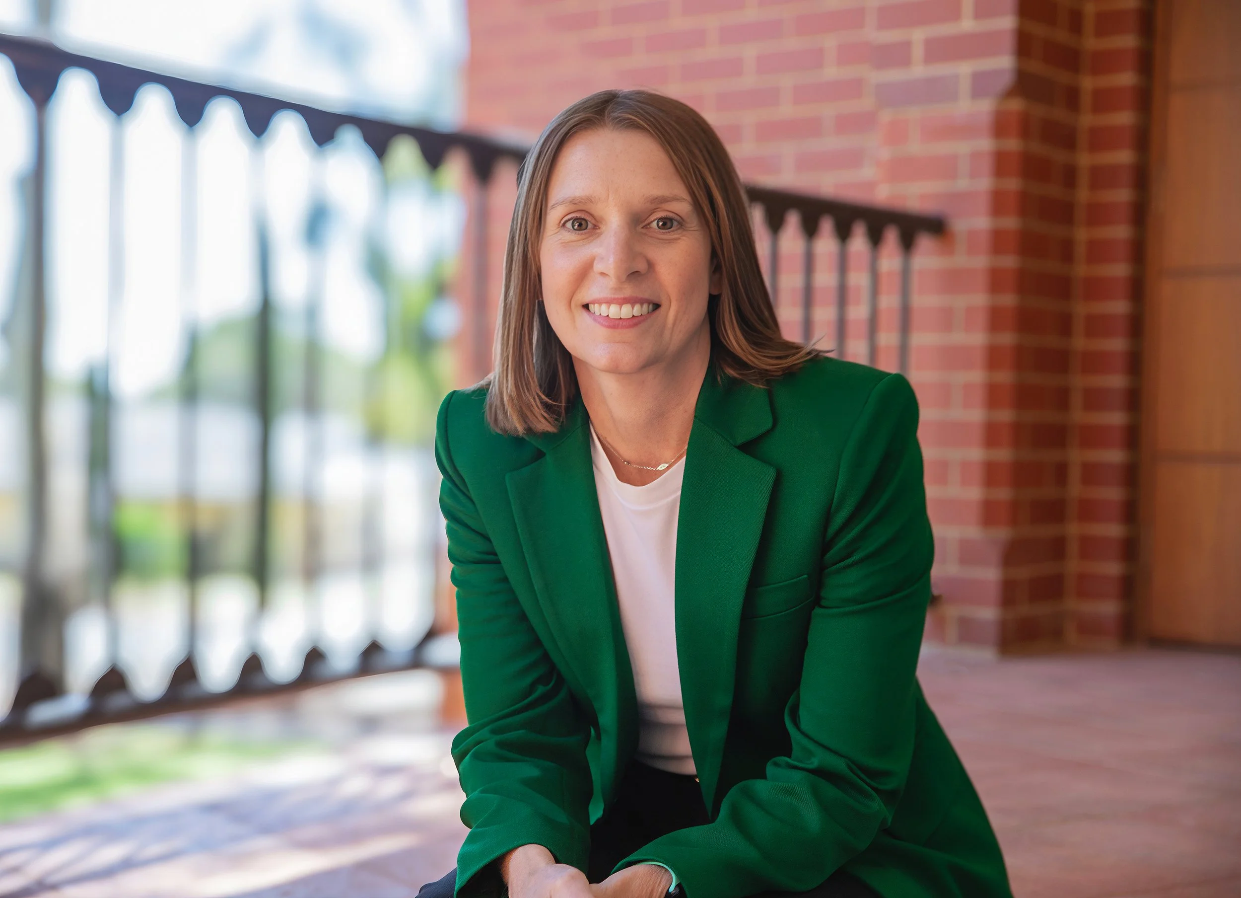 Clare Millwood, the mind behind Marketree, sitting and smiling at camera