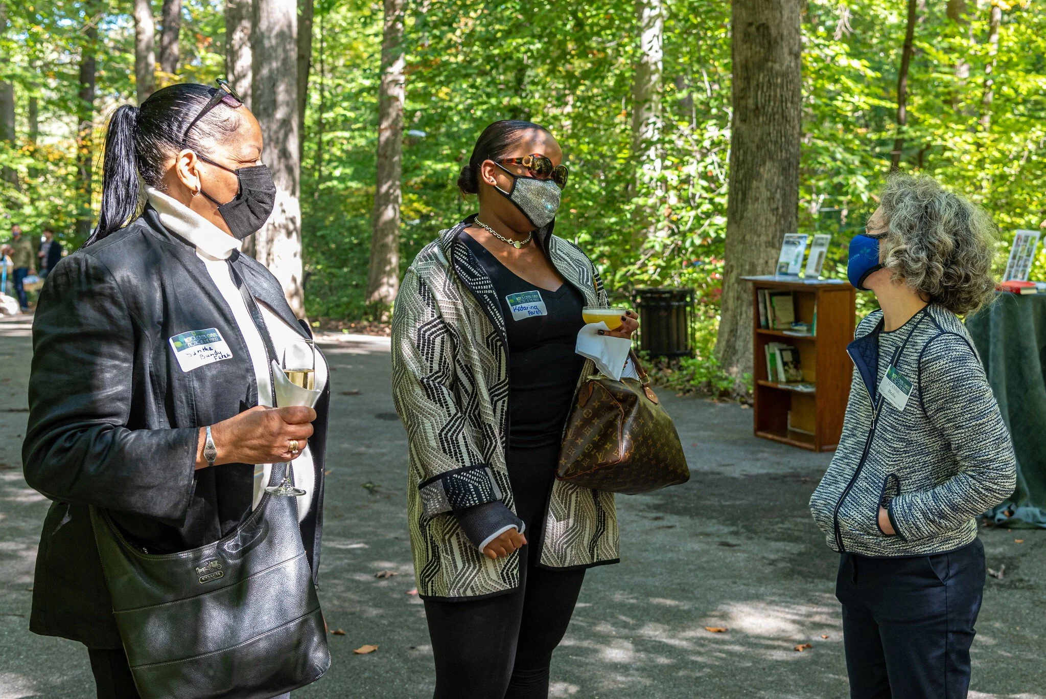 Soiree guests talk to Rock Creek Conservancy Executive Director Jeanne Braha