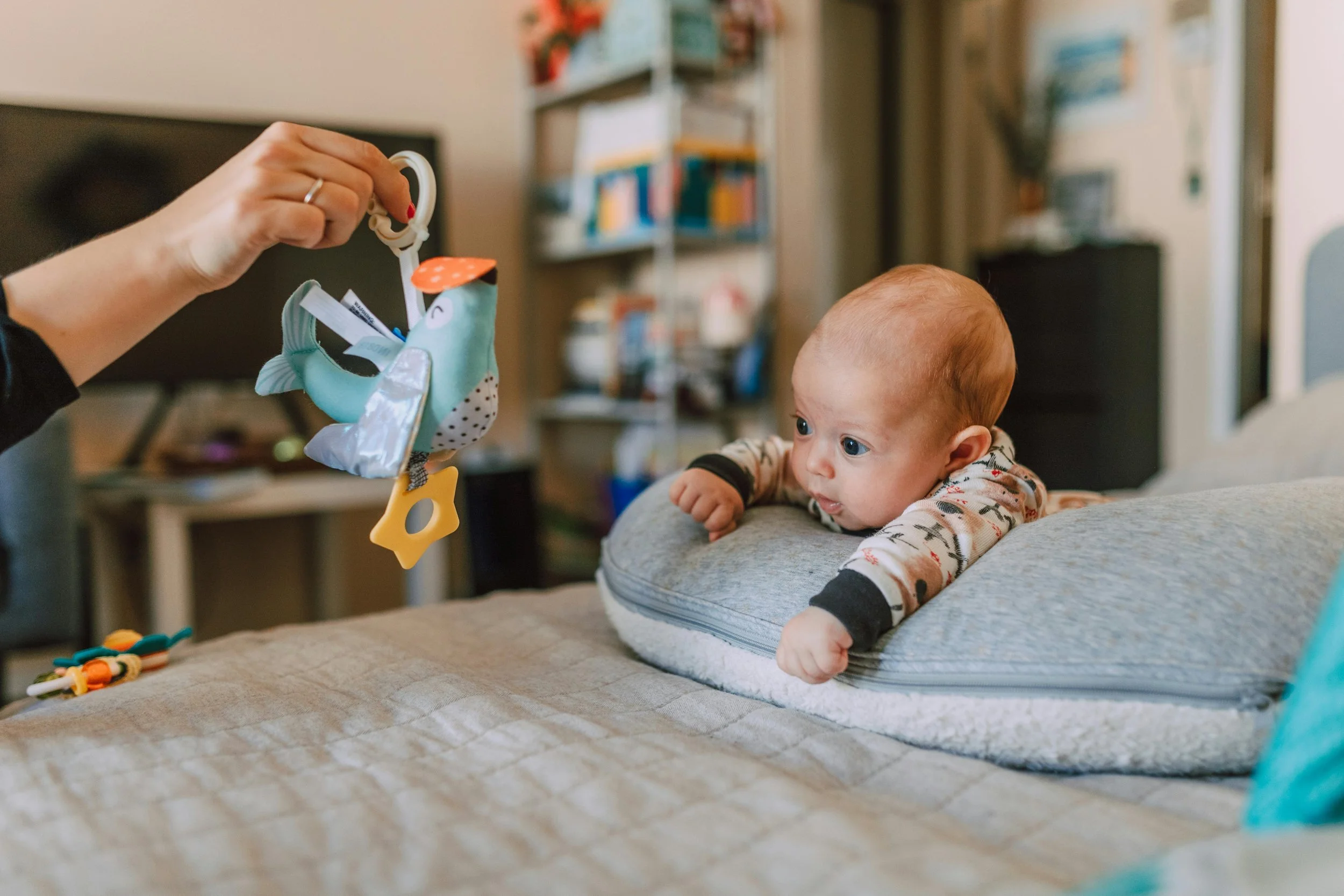 Baby doing tummy time during in-home infant OT visit in Ojai