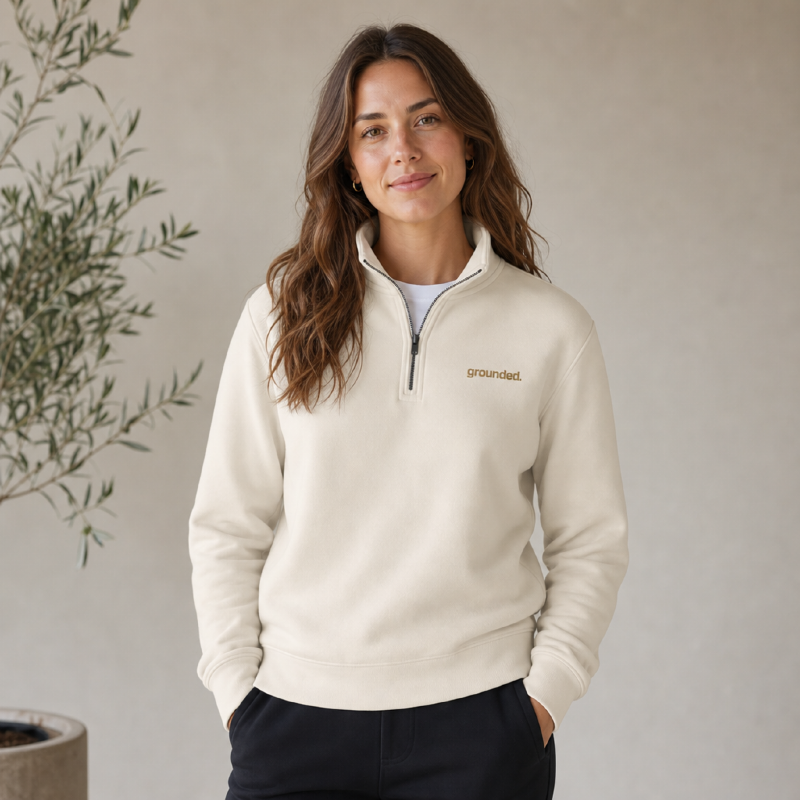 grounded half zip cream woman .png