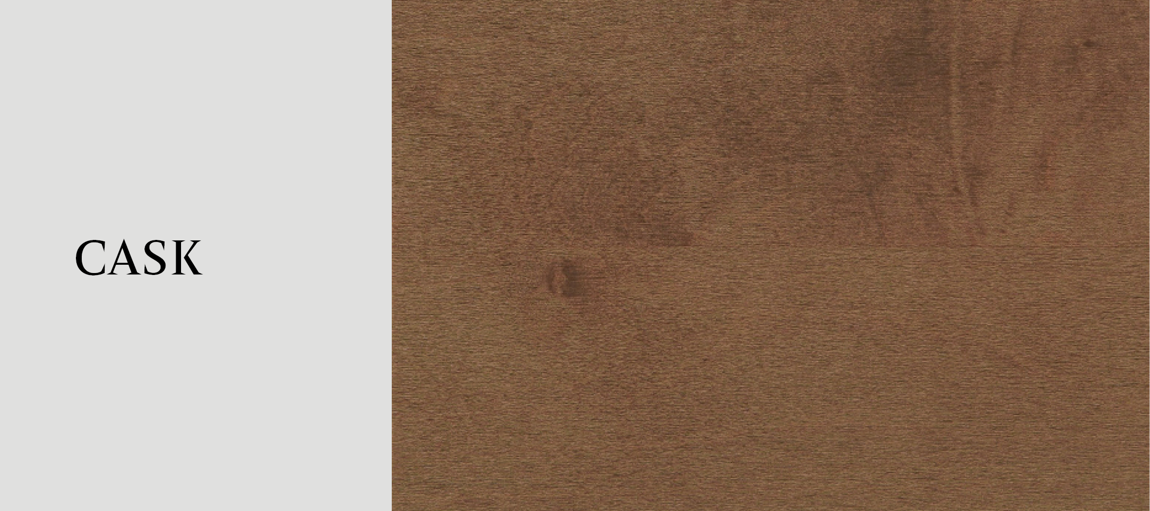 Close-up photo of a wooden cask with the word "CASK" written on a label attached to it.