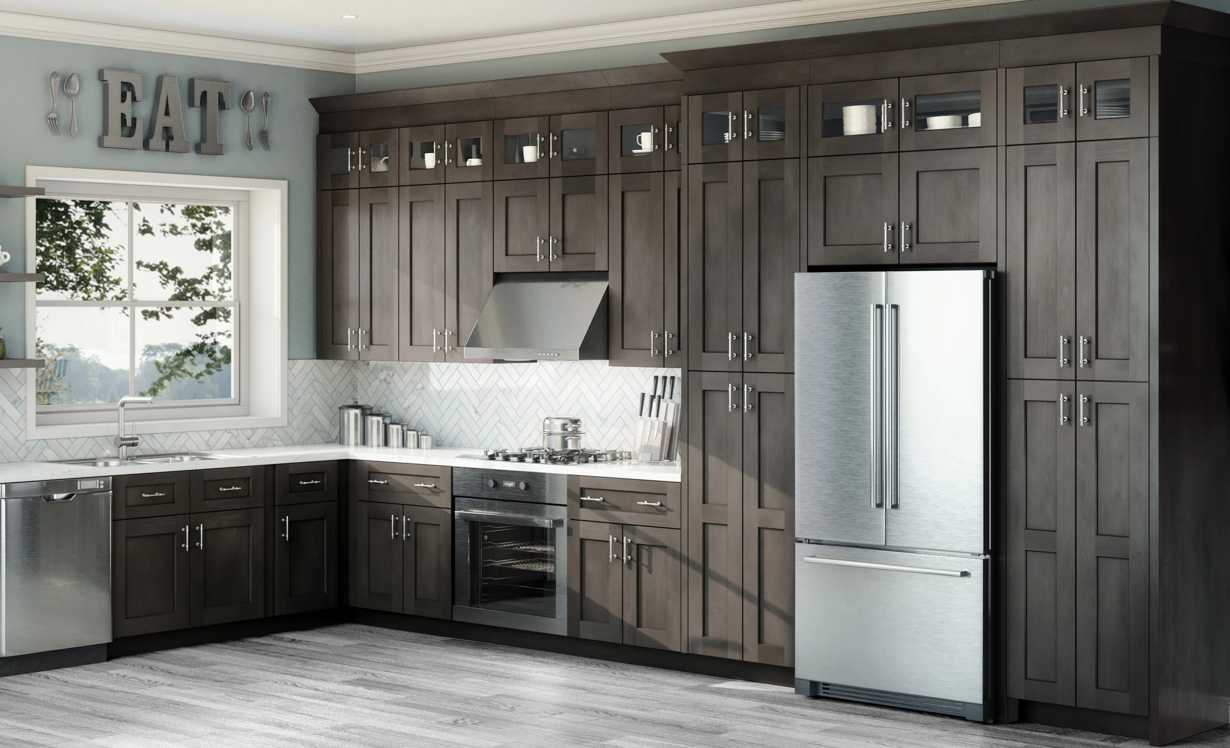 Modern kitchen with dark wooden cabinets, a stainless steel refrigerator, a window with a view of trees, and a countertop with kitchen utensils and appliances.