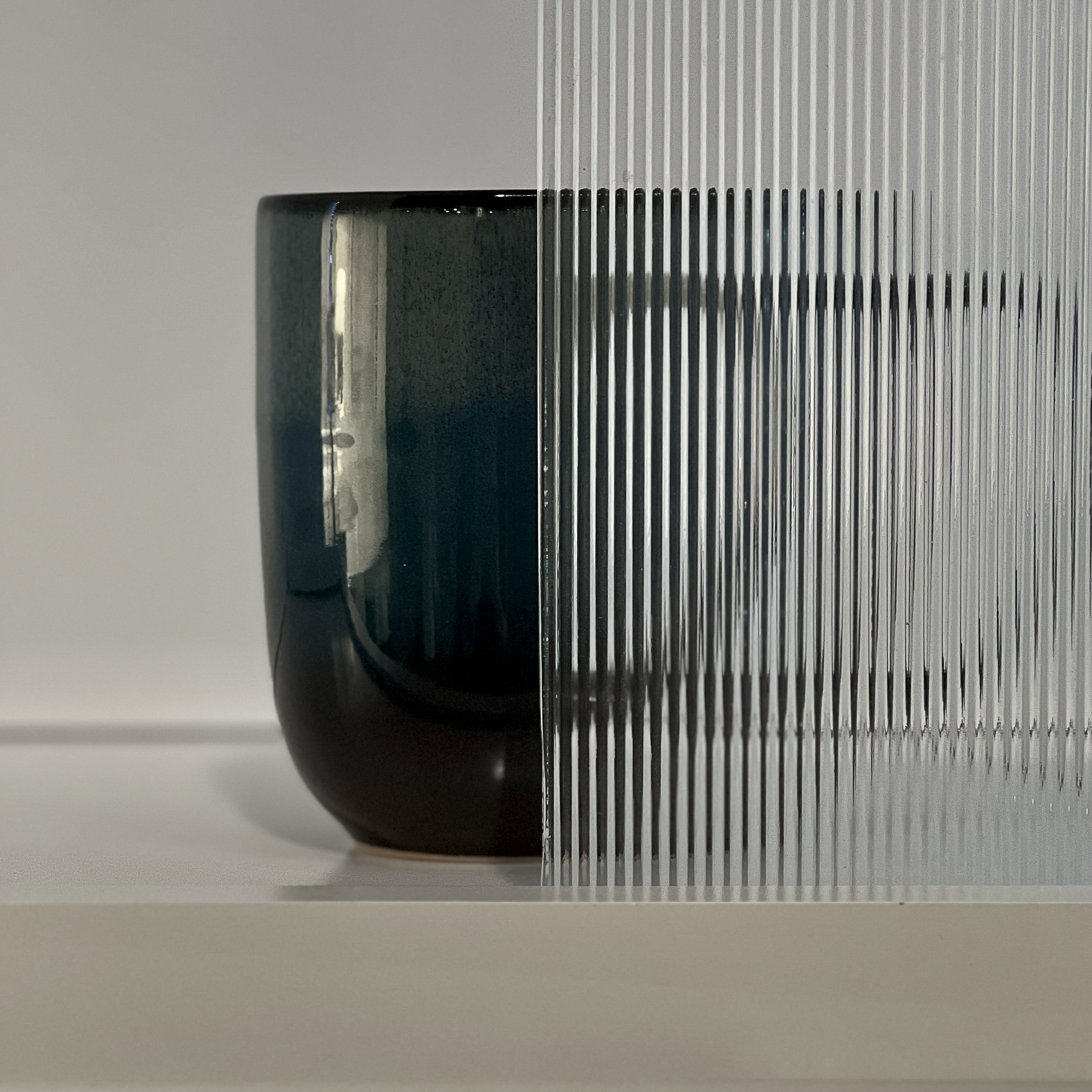 Thin Reeded – Slim vertical lines for a clean, architectural look. Adds movement and texture while maintaining partial visibility.