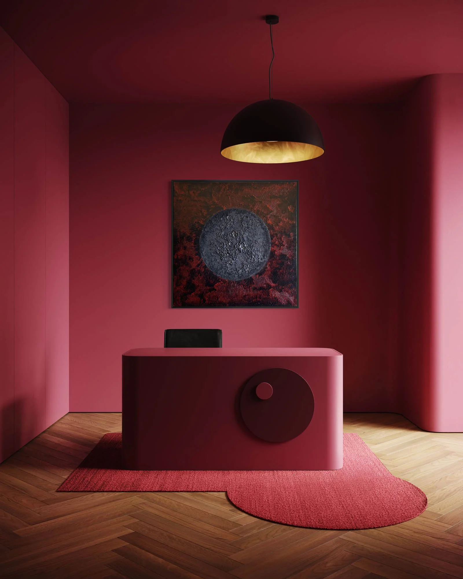 A modern interior corner room painted dark pink, with a black and gold hanging pendant light, a black and pink modern desk, a black chair, a textured round wall art piece, a small red rug, and light wooden floor.
