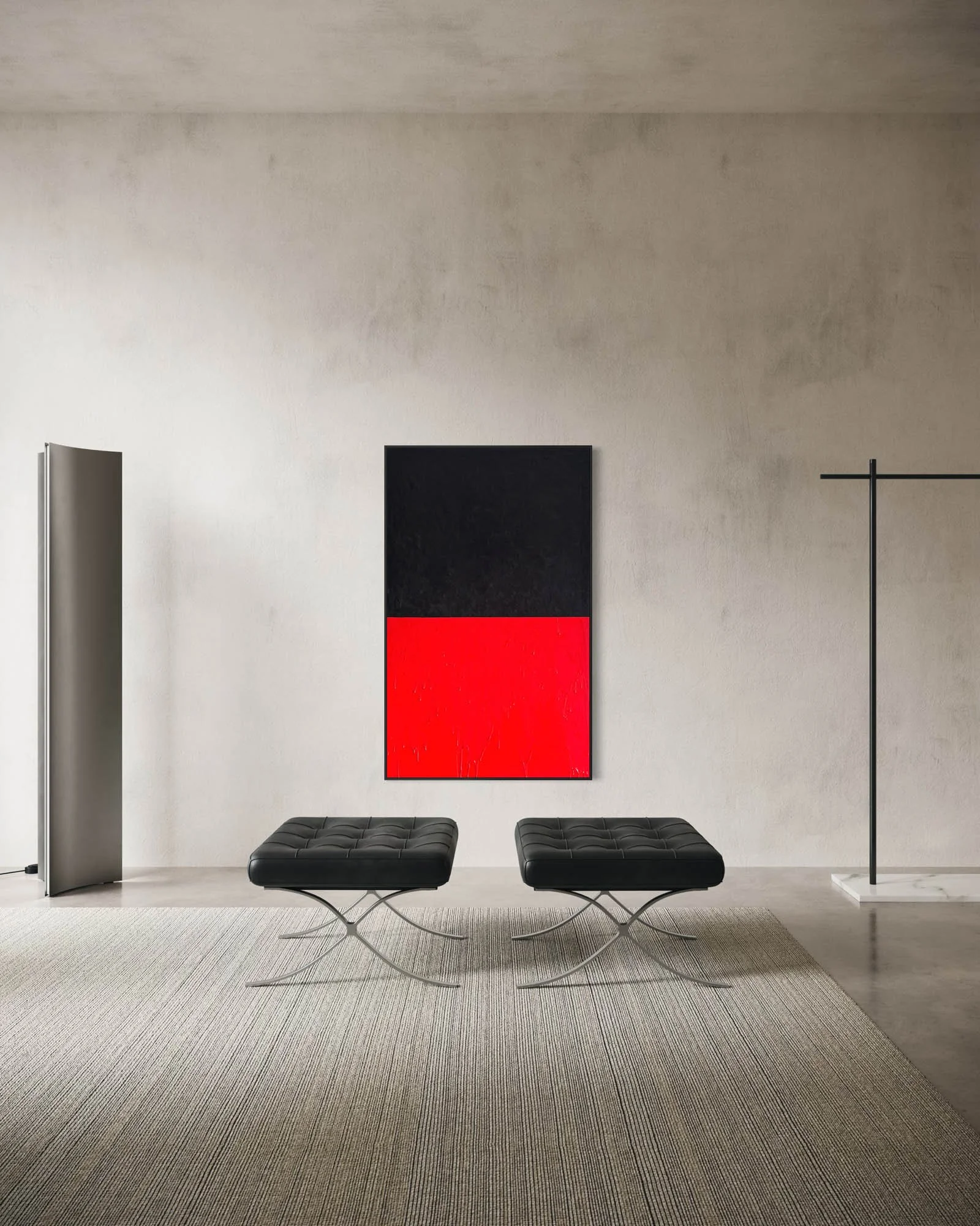 Minimalist modern interior with two black leather tufted ottomans, a black and red abstract painting on a light-colored wall, a folding room divider on the left, and a black clothing rack on the right, all on a beige carpeted floor.