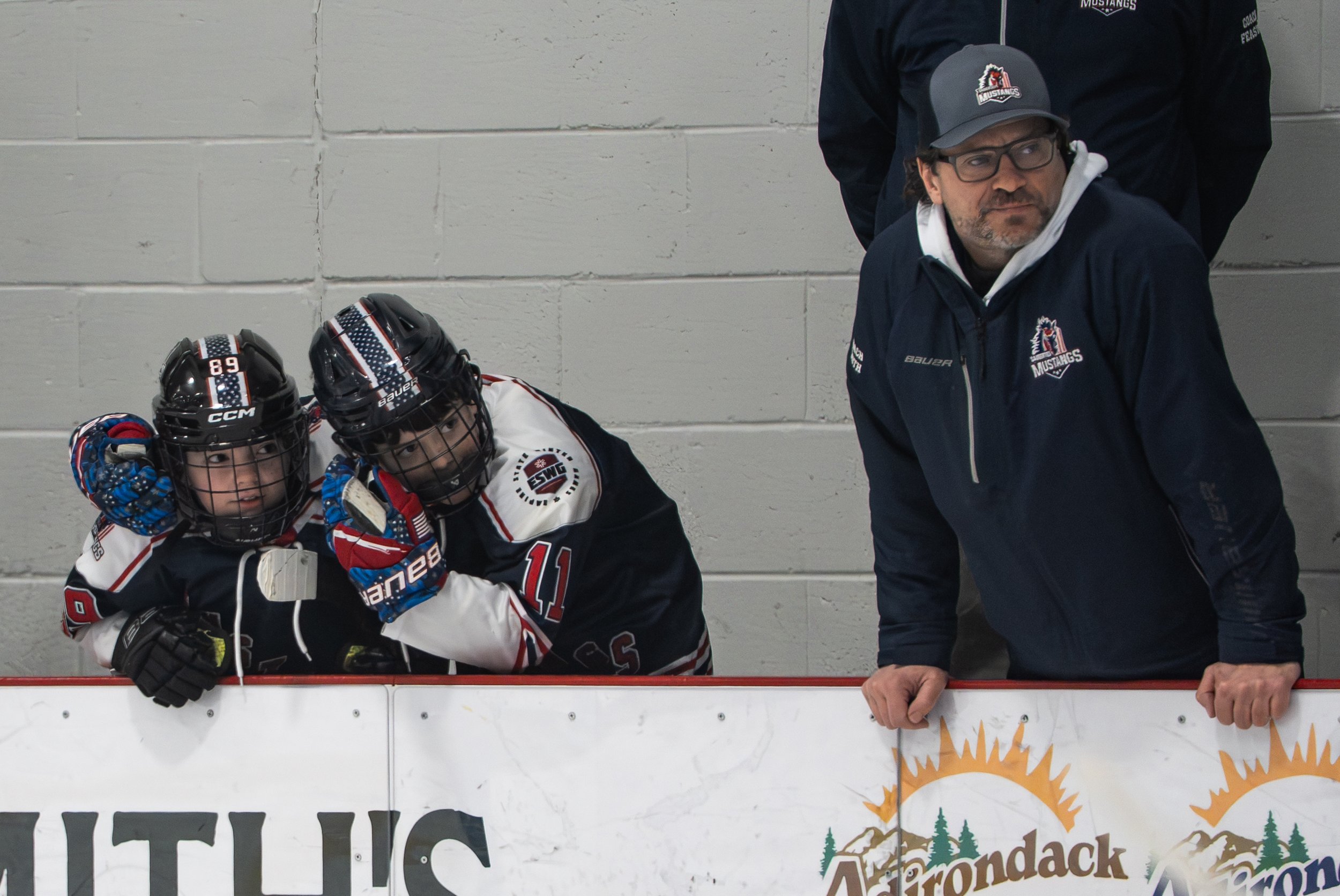 Saugerties Mustangs players and coaches anxiously wait for the time to run out in the third period during the gold medal game on Feburary 8, 2026 at the Saranac Lake Civic Center in Saranac Lake, NY. (Isaac Williams/The Newhouse School)