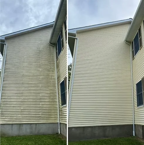 Comparison of the same house's siding before and after cleaning, showing a dirty, stained siding on the left and a clean, bright siding on the right.
