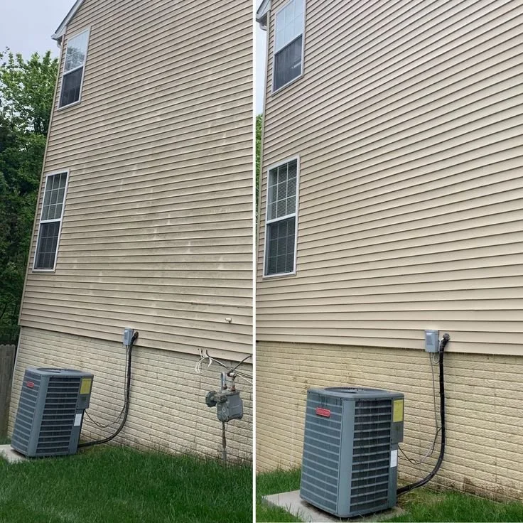 Comparison of dirty and clean side of house siding with air conditioning unit and outdoor electric meter.