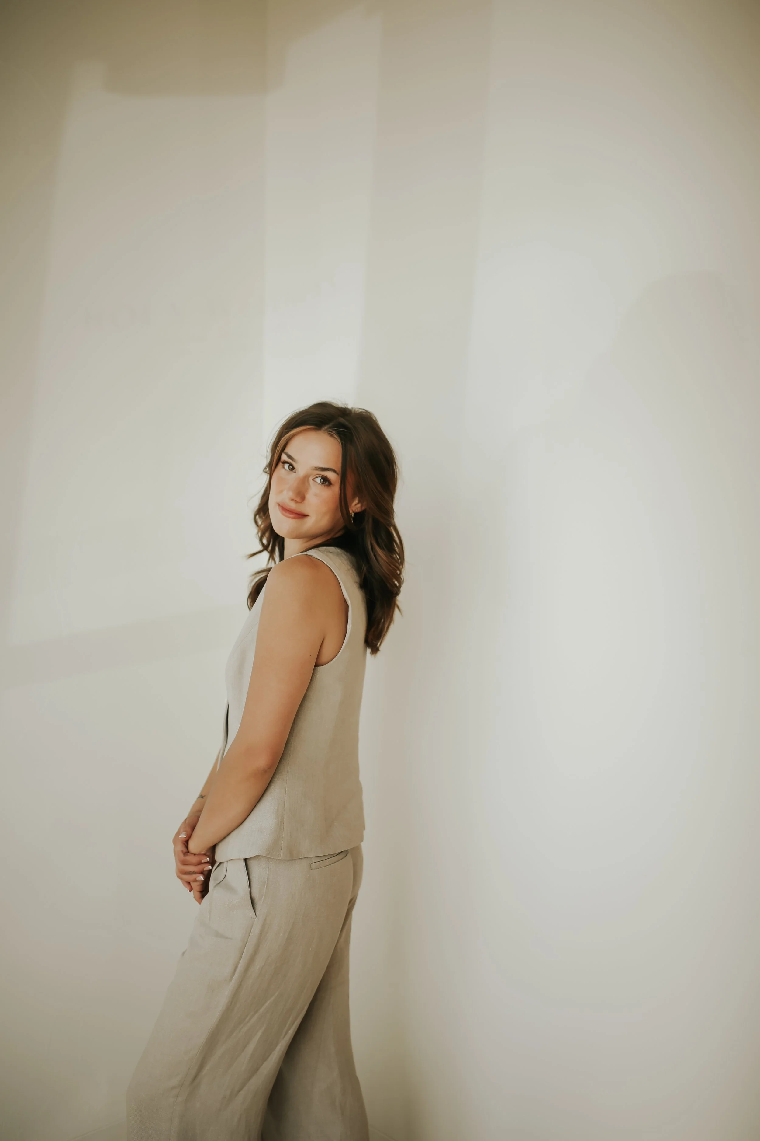 Portrait of Lainee, acupuncturist and founder of Ezer Wellness.