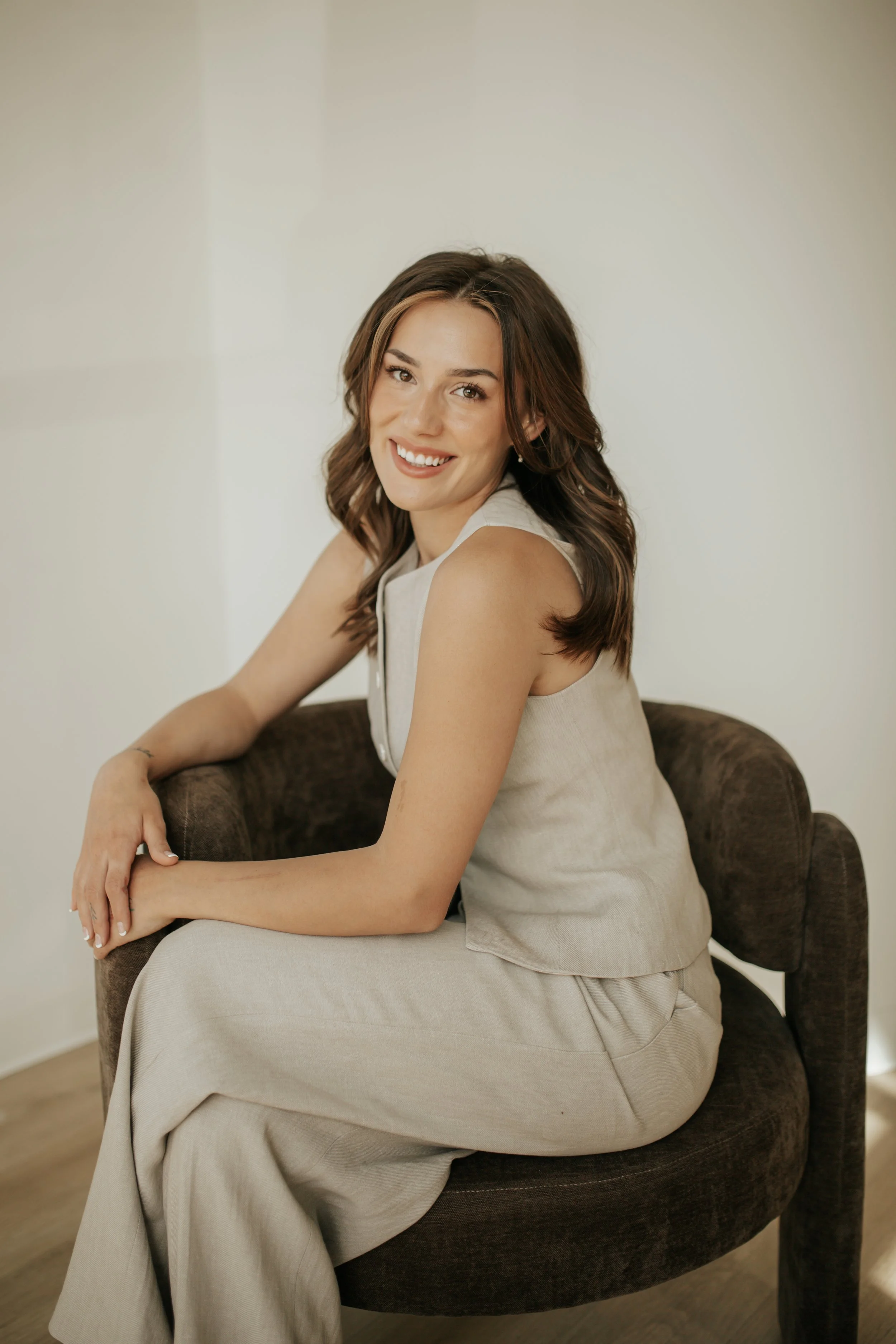 Portrait of Lainee, acupuncturist and founder of Ezer Wellness.