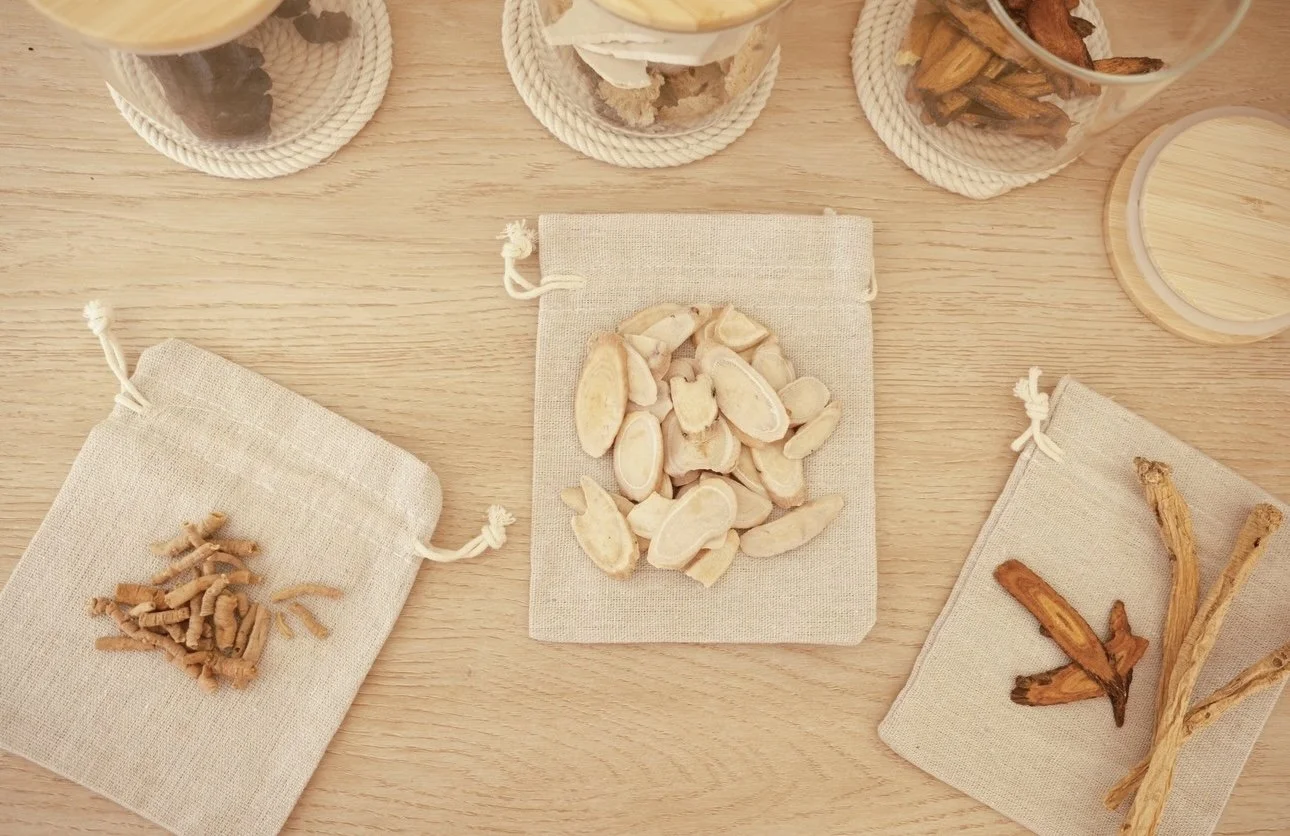 Dried herbs displayed for herbal medicine treatment.