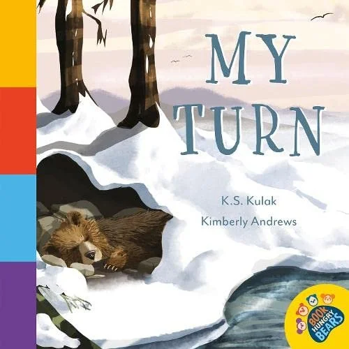 Cover of a children's book titled "My Turn" by K.S. Kulak and Kimberly Andrews, featuring an illustration of a forest scene with snow, trees, and a sleeping bear in a cave, with a yellow badge that says "Book & Quacky Bears."