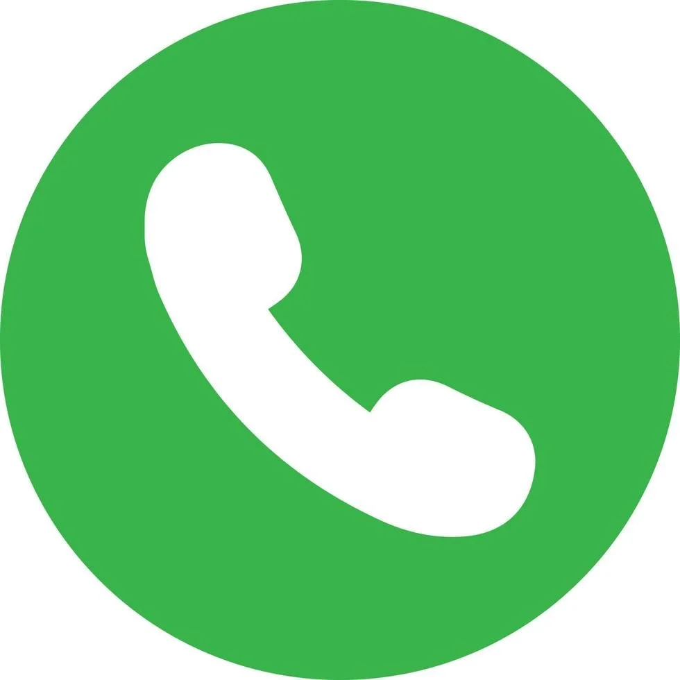 A green circle with a white telephone handset icon in the center.
