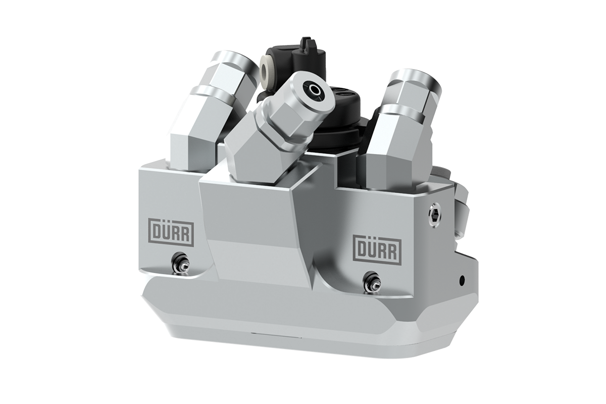 A mechanical component with multiple adjustable connectors, labeled 'DÜRR', used in industrial automation or manufacturing processes.