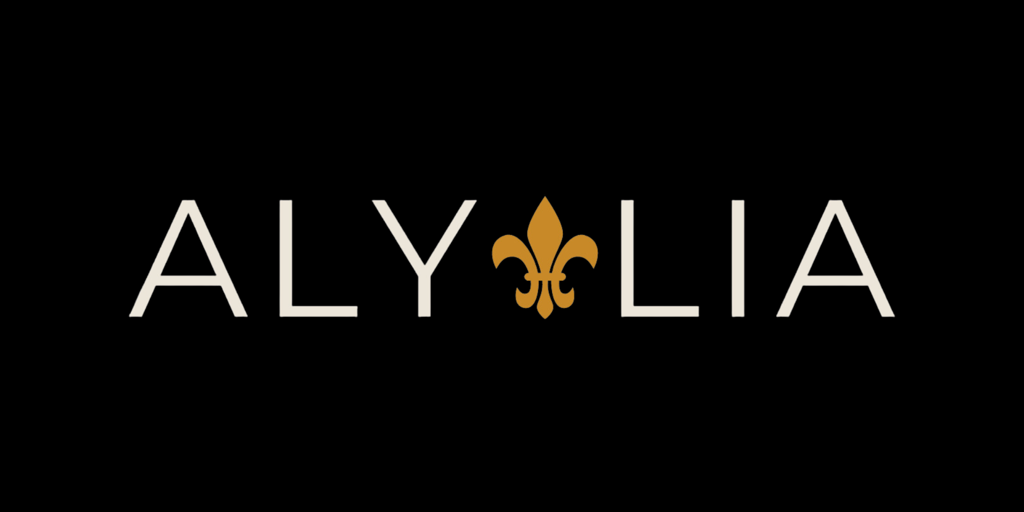 Logo for Aly and Lia featuring the name in uppercase letters with a gold fleur-de-lis symbol replacing the letter R, on a black background.