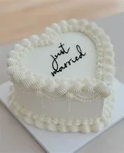 Heart-shaped white cake with