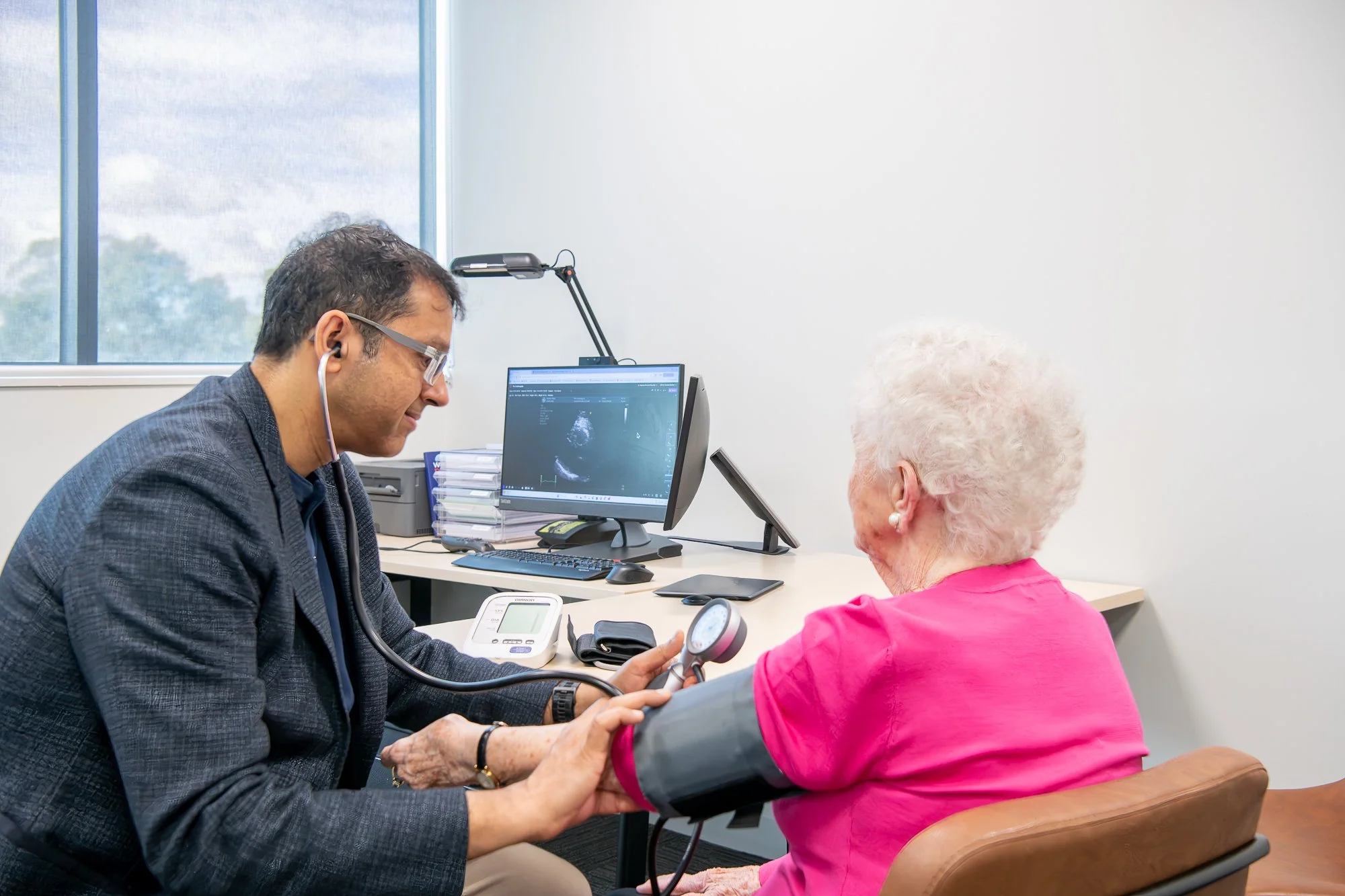 Patient being fitted with a 24-hour blood pressure monitor at Melbourne Cardiology Group
