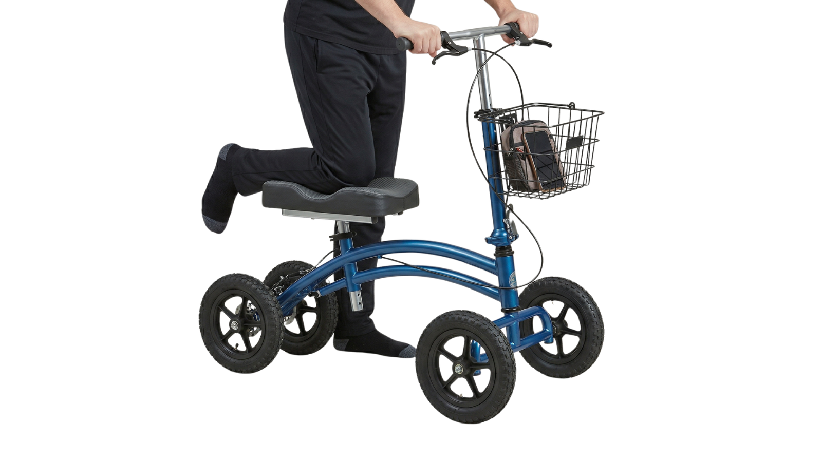 Person kneeling on a small blue mobility scooter with a basket on the front containing a backpack and phone.
