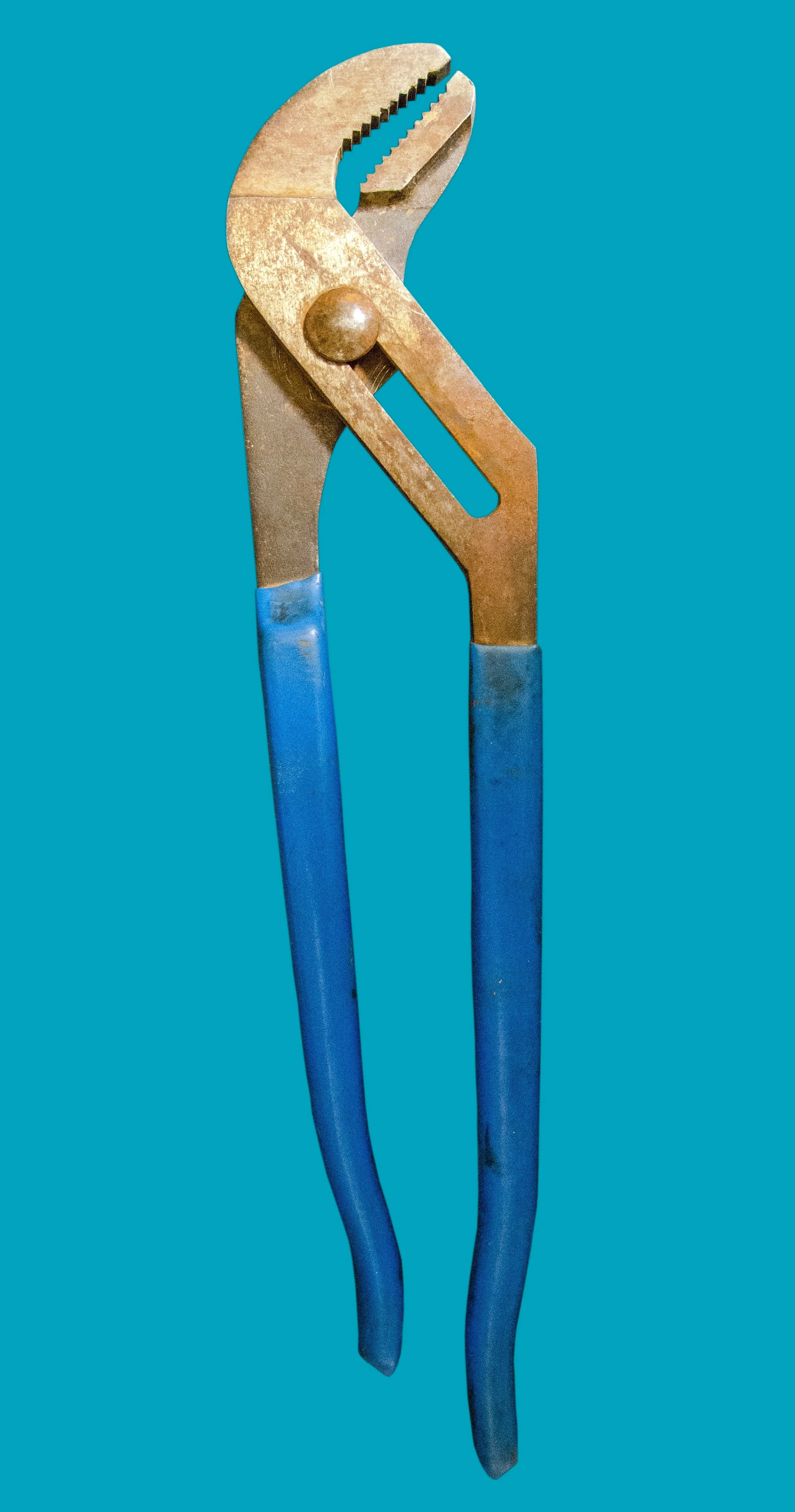 An adjustable pair of pliers with blue handles against a teal background.