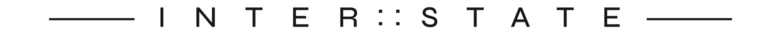 Close-up of a logo with the word 'INTERSTATE' in black capital letters on a gray background.