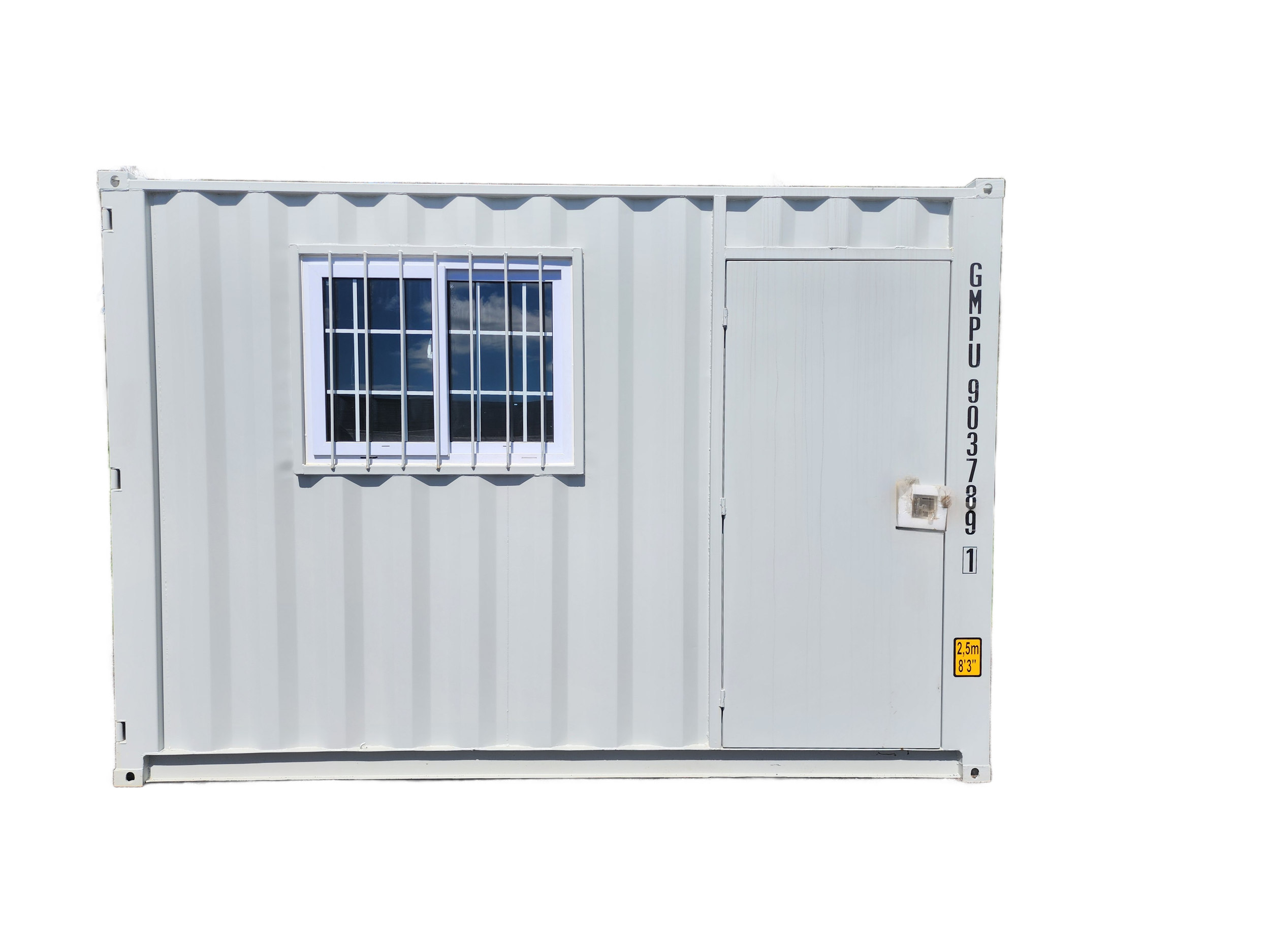 White shipping container converted into a secure room, featuring a barred window, access door, and height warning label