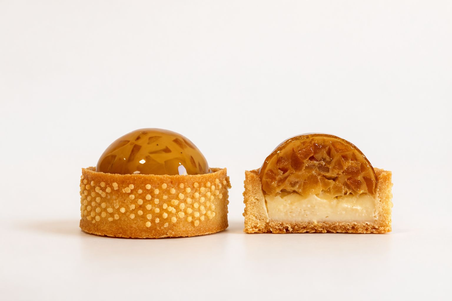 Cross section of a handcrafted caramelised apple tart showing the slow-cooked apple filling and artisan pastry. Luxury dessert boxes in Vaucluse.