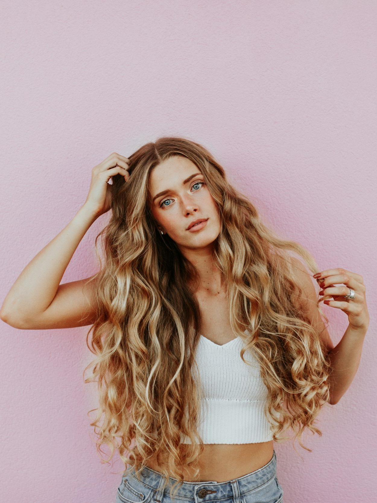 Young woman with long, wavy blonde hair