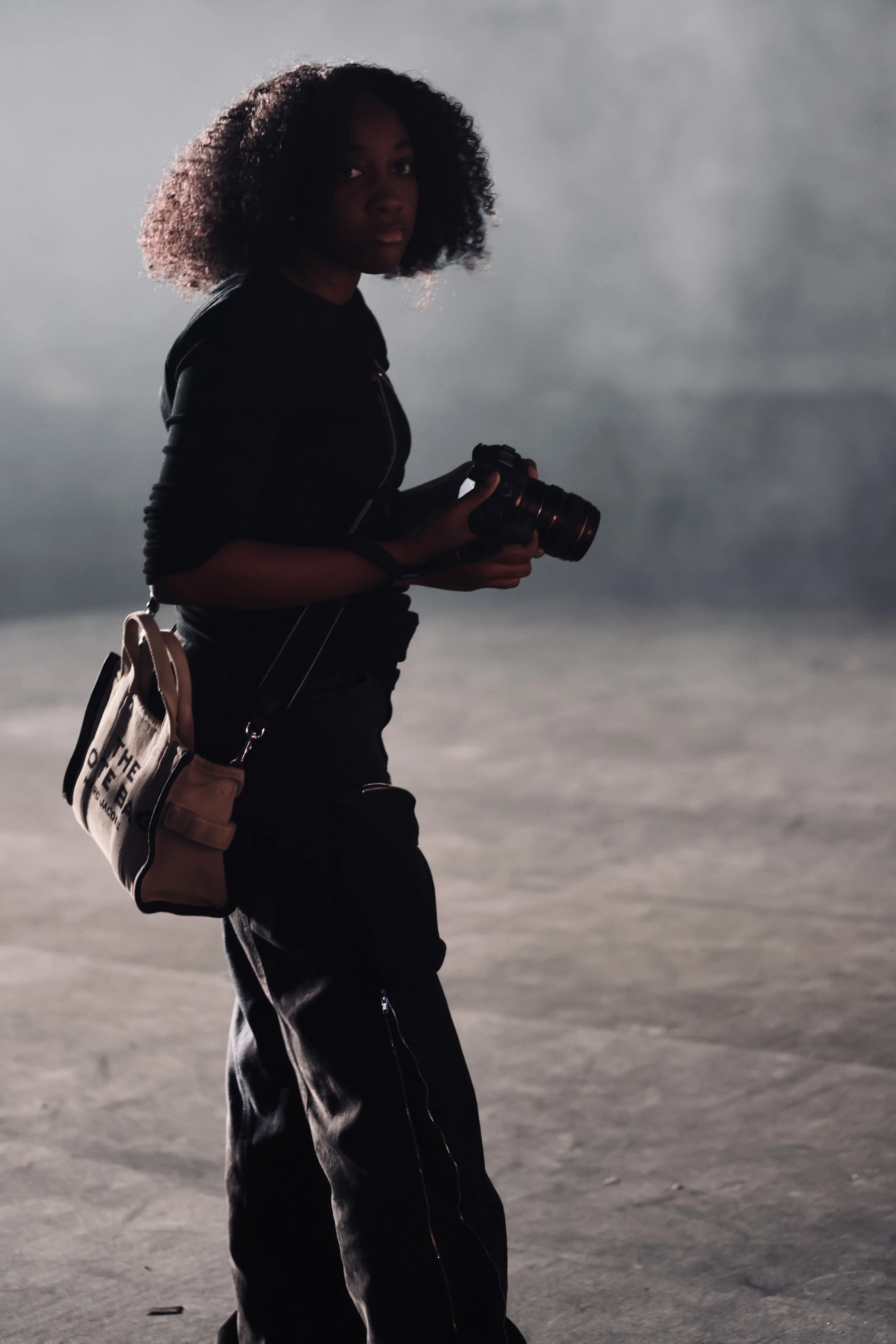 Bri holding a camera