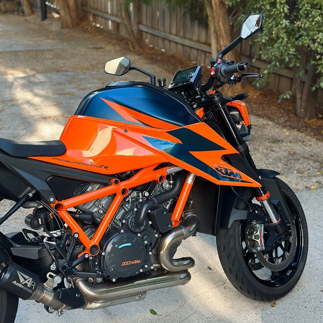 Ridden daily. Exposed to the elements. Chemical stained plastics, rusty exhaust, and the paint had lost it's depth. It came in tired, but far from done.

Swipe through the details. Every mark had a story. We didn't just clean it, we brought its chara